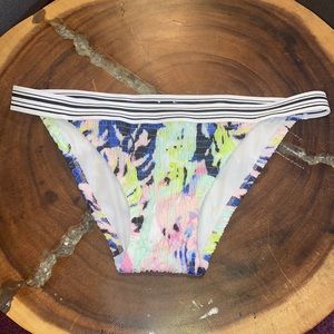 Victoria Secret multi color swim bottoms. Size L